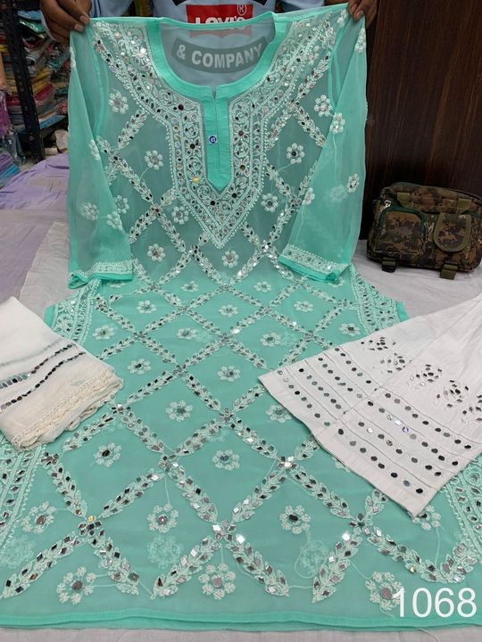 Georgette_kurti_with_mirror_and_chikankari_work